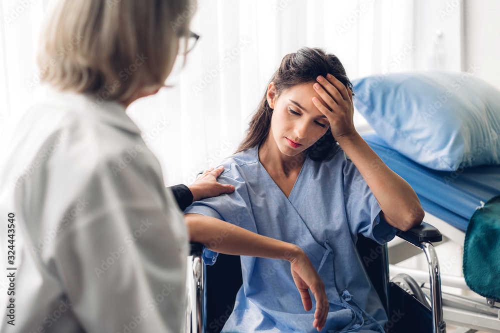 Female doctor discussing and consulting with woman patien in hospital.healthcare and medicine Female doctor discussing and consulting with woman patien in hospital.healthcare and medicine