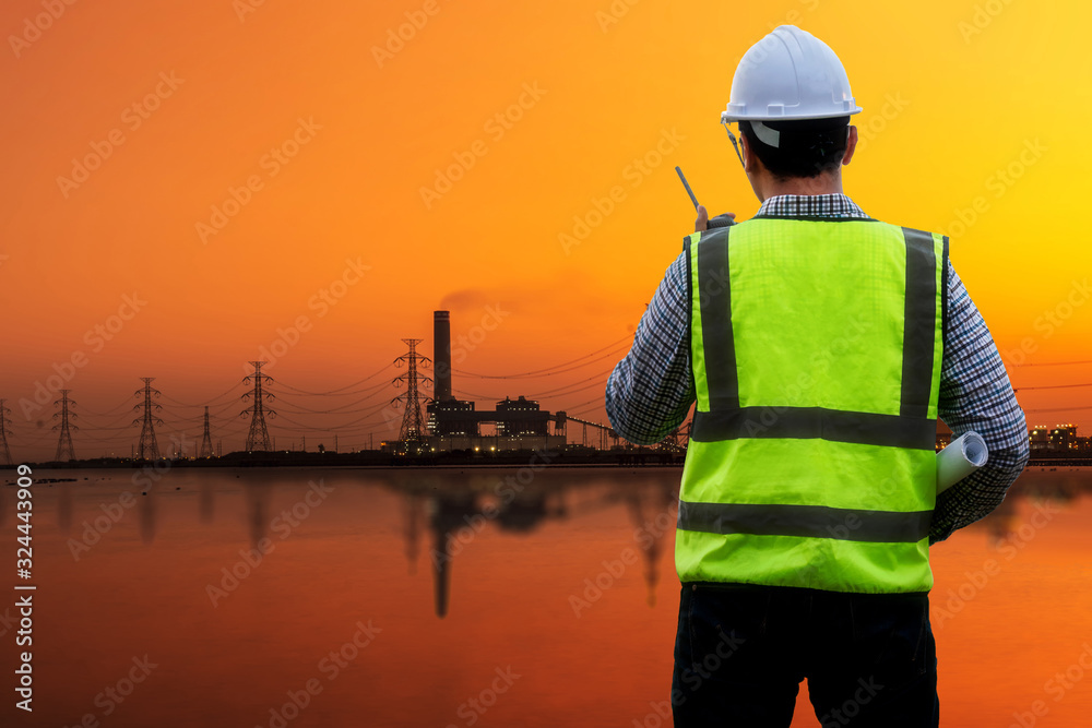 Double exposure of Engineer or Safety officer with power plant construction . Double exposure of Engineer or Safety officer with power plant construction .