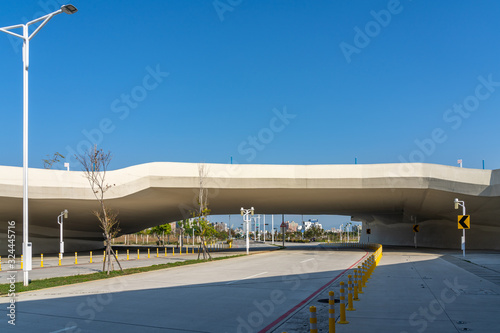 Street view of Shuinan Economic and Trade Area in blue sky sunny day. Former Shuinan Airport, lot of green space in here. Xitun District, Taichung City, Taiwan photo