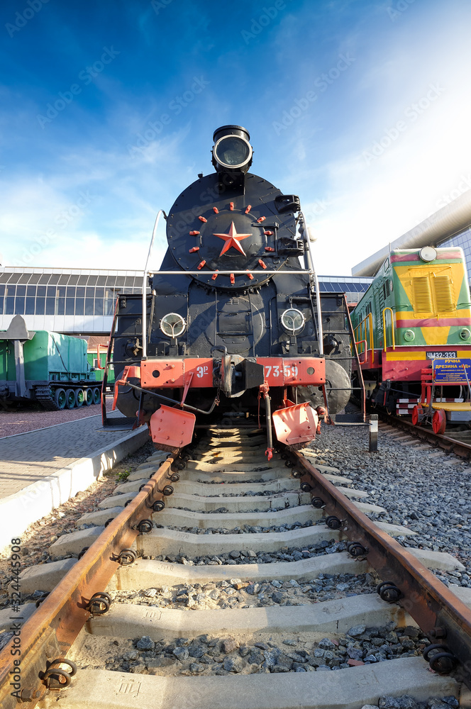 Obraz premium Image of old soviet steam locomotive on the rails