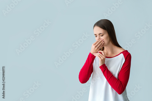 Young woman suffering from ...