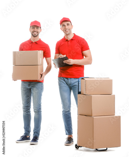 Delivery men with boxes on ...
