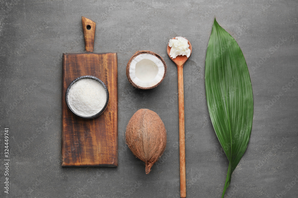 Composition with different coconut products on grey background