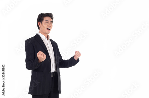 Handsome, talented, Asian business men raise their hands to express their happiness because of their work on the white background.isolated