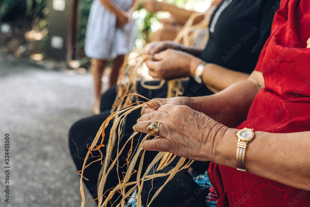 Different ages females weaving bascets on the craft workshop, sitting together. Diversity and inclusion in creativity. Women community. Australia multicultural.