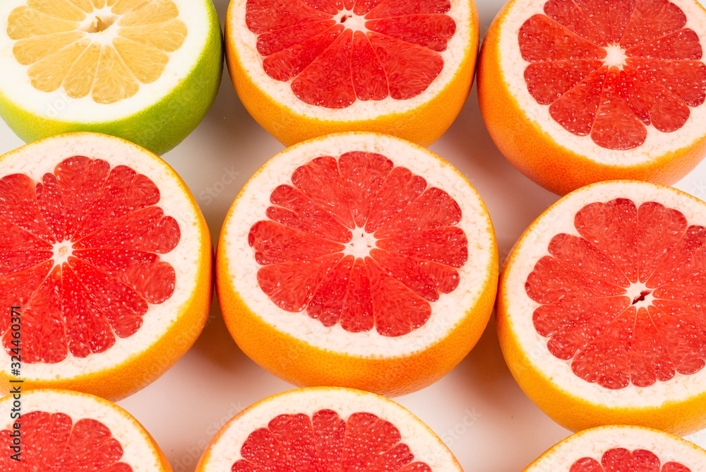 Pomelo and grapefruit slices background. Pomelo and grapefruit slices background.