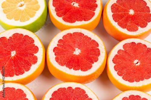 Pomelo and grapefruit slices background.