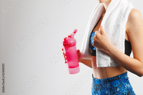 Cropped shot of a fitness woman posing with a towel