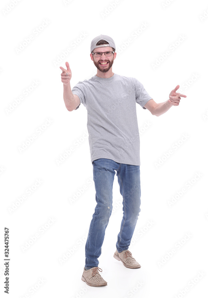 in full growth. casual guy in a baseball cap in full growth. casual guy in a baseball cap