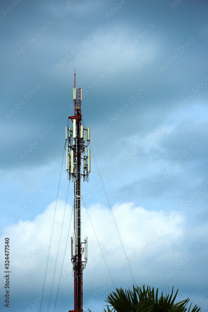 Wireless Communication Antenna With bright sky.Telecommunication tower with antennas.