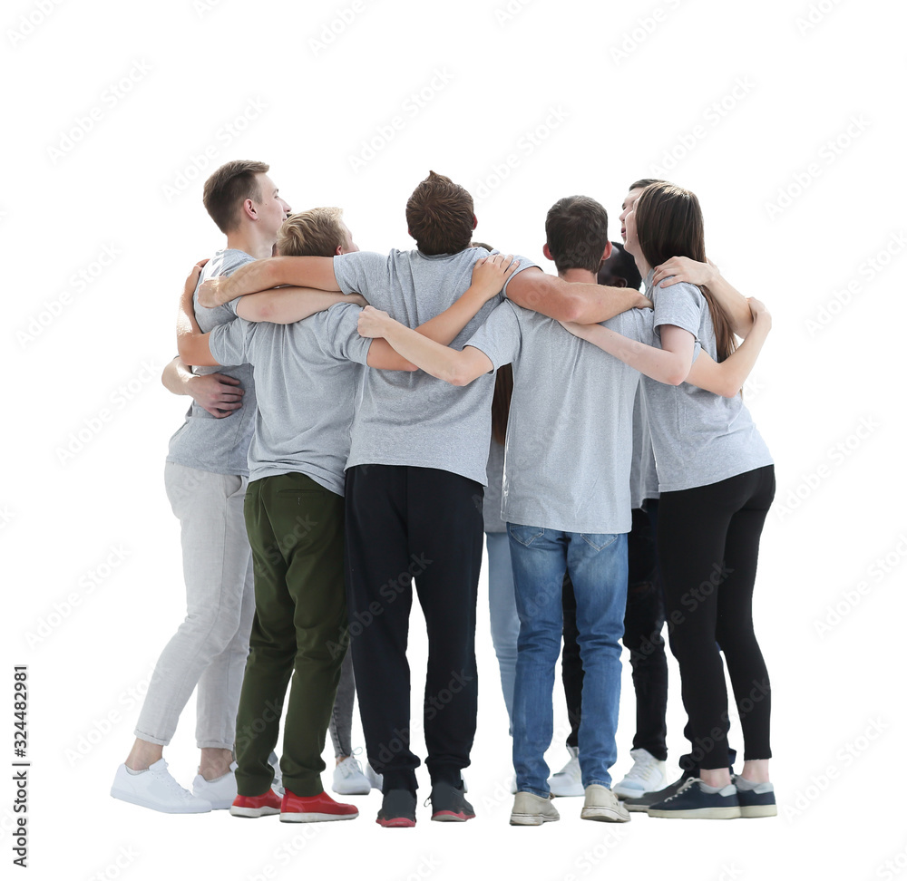 Fototapeta premium in full growth. a group of young people standing in a circle