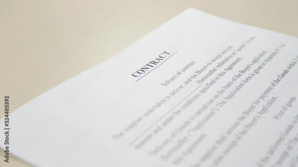 The hand of the business person emphasizes the word The hand of the business person emphasizes the word