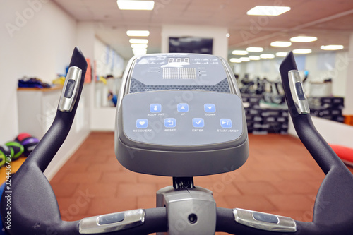 Sport equipment, Exercise bike. Modern gym interior with equipment. Healthy lifestyle concept