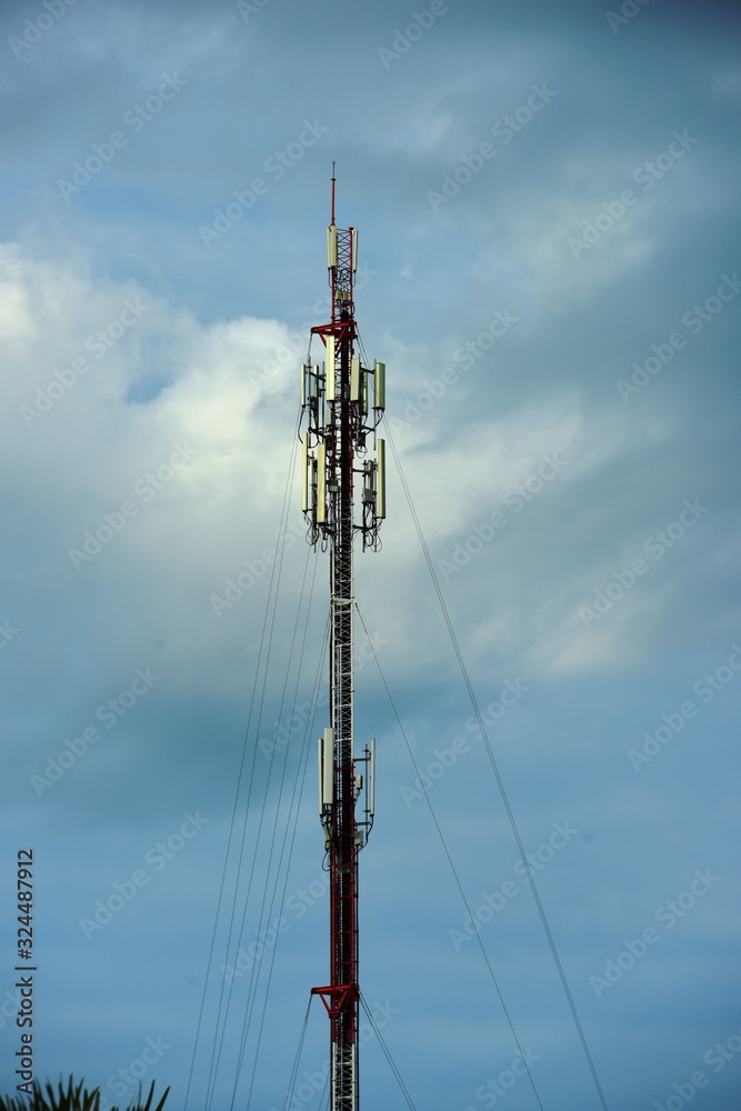 Wireless Communication Antenna With bright sky.Telecommunication tower with antennas.	