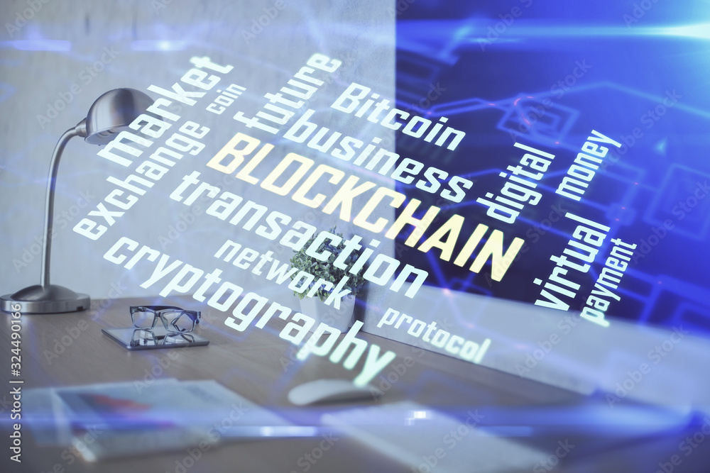 Multi exposure of blockchain and crypto economy theme hologram and table with computer background. Concept of bitcoin cryptocurrency. Multi exposure of blockchain and crypto economy theme hologram and table with computer background. Concept of bitcoin cryptocurrency.
