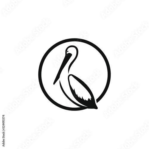 Artistic stylized pelican icon. Pelican circle logo design. Silhouette of birds. photo