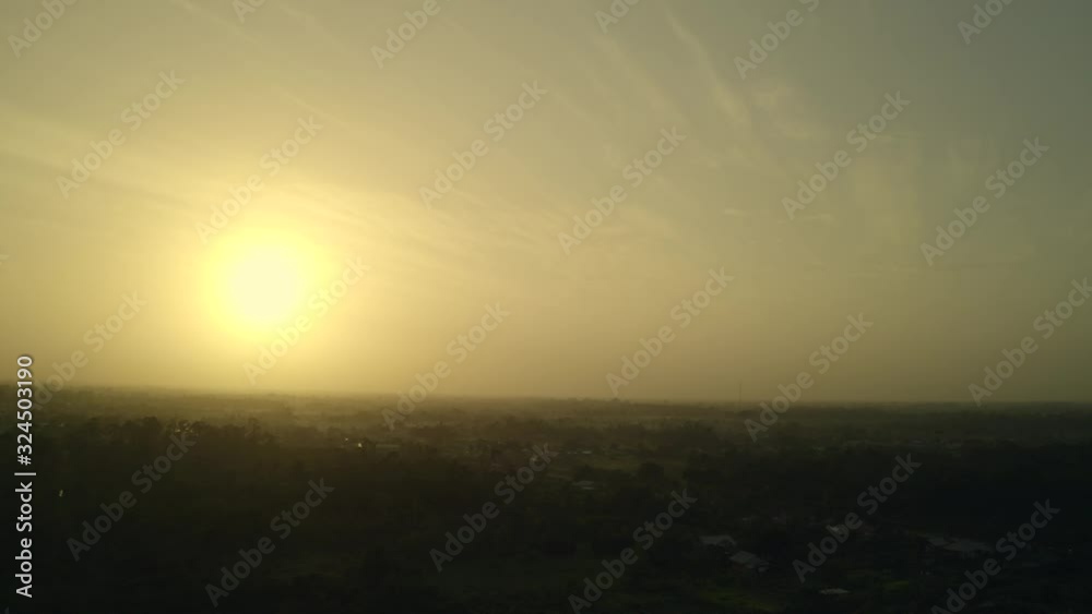 Sunrise over rainforest in Suriname, aerial view Sunrise over rainforest in Suriname, aerial view