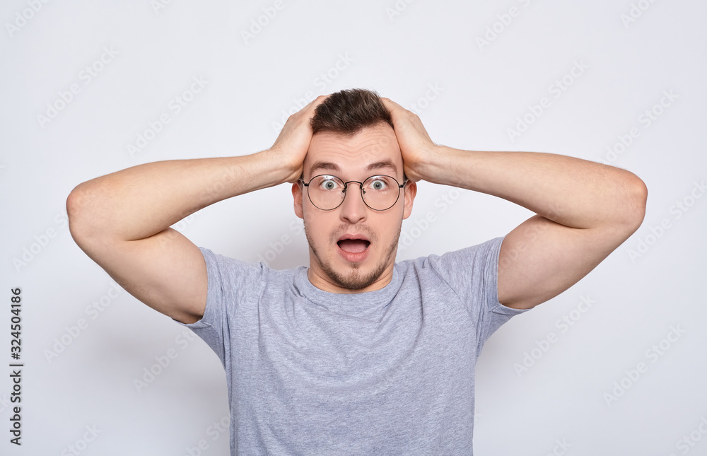 A double man with glasses and a T-shirt. A double man with glasses and a T-shirt.