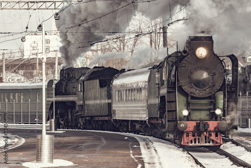 Retro train departs from the railway station.