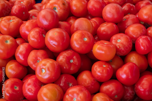 fresh red tomatoes at the market