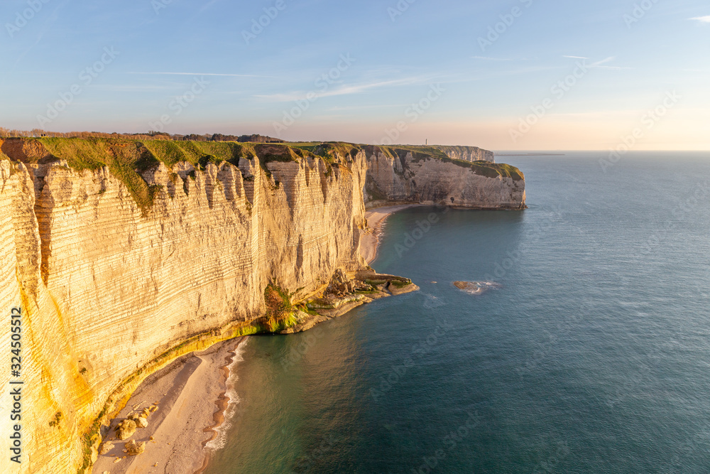 Rocks on the coast of the English channel strait. Etretat village, Normandy region, France. Rocks on the coast of the English channel strait. Etretat village, Normandy region, France.
