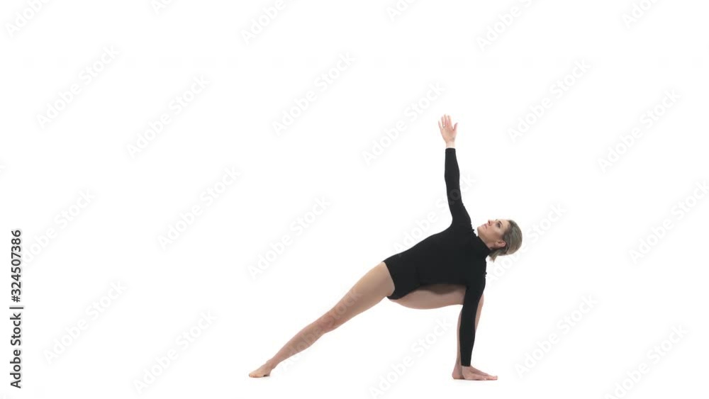 Woman doing stretching exercises. Isolated, on white background. Yoga and healthy lifestyle concept Woman doing stretching exercises. Isolated, on white background. Yoga and healthy lifestyle concept