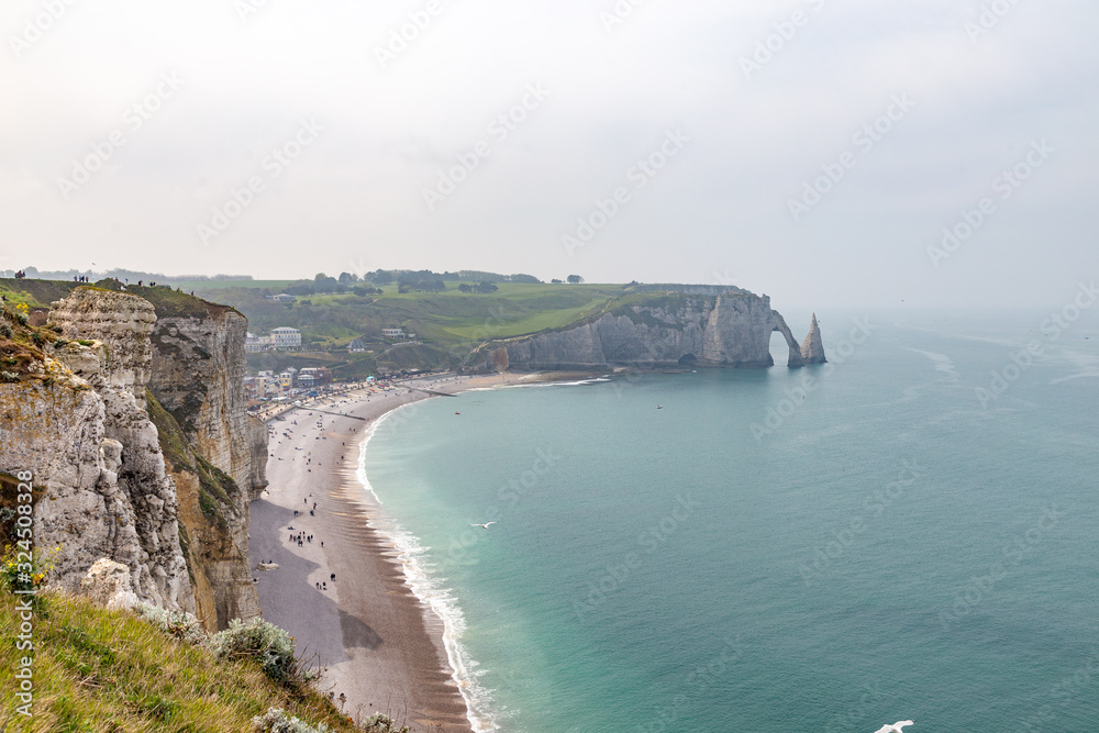 Rocks on the coast of the English channel strait. Etretat village, Normandy region, France. Rocks on the coast of the English channel strait. Etretat village, Normandy region, France.