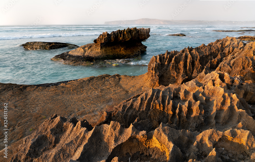Jaggard rocks and a calm sea at cape bridgewater in southwest victoria australia Jaggard rocks and a calm sea at cape bridgewater in southwest victoria australia