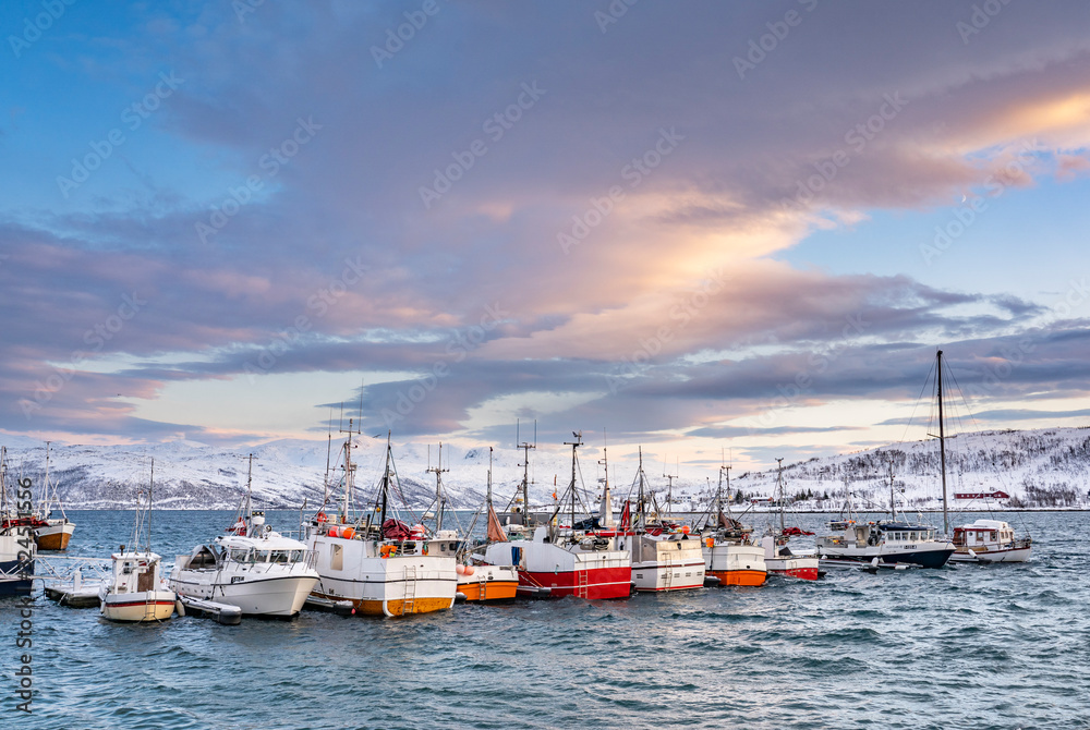 fishing harbour of Vengsoy in northern Norway near Tromso at the end of the polar night