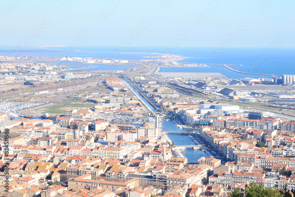Fototapeta premium Port and city of Sete, a seaside resort and singular island in the Mediterranean sea, it is named the Venice of Languedoc Rousillon, France