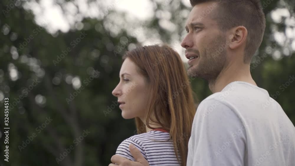 Beautiful couple on an alley in the park, date, walk Beautiful couple on an alley in the park, date, walk