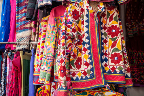 Traditional Indian clothes and accessories market at Udaipur city, Rajasthan, India