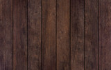 Old grunge dark textured wooden background, top view brown paneling. Vintage