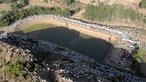 Drone view over Ethiopian Timkat Ceremony Gathering at reservoir for baptism , Axum, Ethiopia,19.1.2020 photo