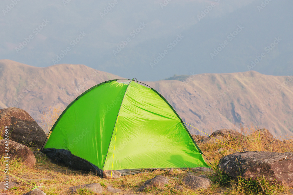 Set up a tent on the hill Full of grasslands