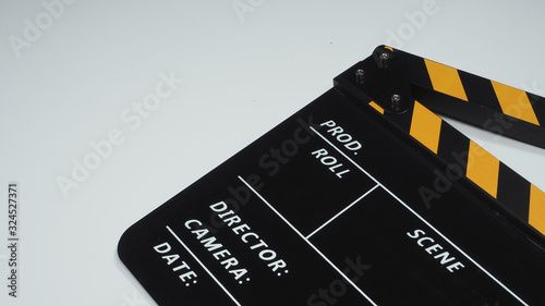 clapperboard or Movie slate or clapper board in yellow and black color.It is used in video production and film industry on white background.