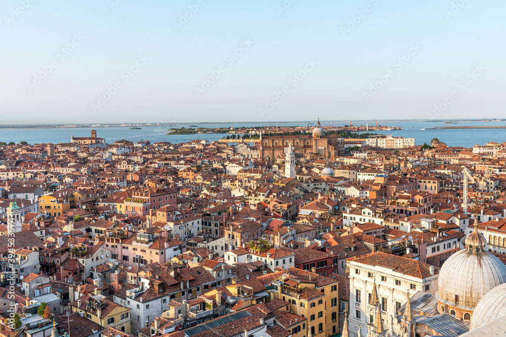 Picturesque panoramic view of Venice, Italy. Aerial scenery view with red roofs of houses.