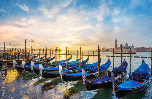 Landscape with  Gondolas and San Giorgio Maggiore church in Venice at sunrise, Italy