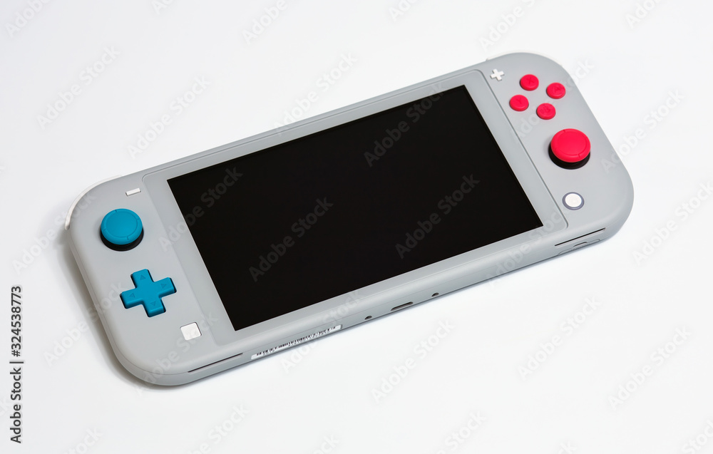 MOSCOW, RUSSIA - February 18, 2020: Grey Nintendo Switch Lite on white  background. Latest entry into handheld gaming, priced at $199.99 Stock  Photo | Adobe Stock