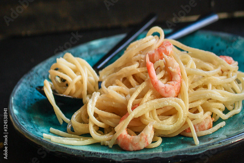 pasta prawn  spaghetti shrimp cream sauce and seafood   menu concept. food background. top view. copy space