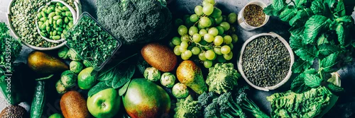 Panel kuchenny z motywem Variety of Green Vegetables and Fruits on the grey background, banner size