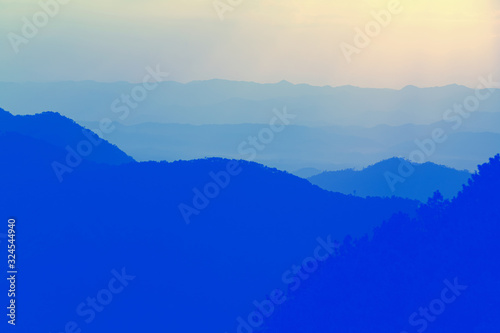 Trendy blue color of moutain hill layer. © dodotone