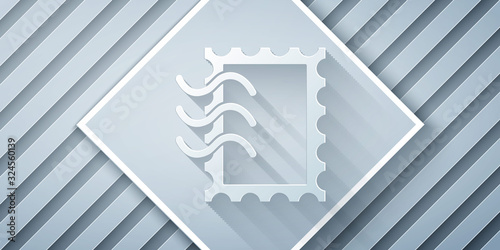 Paper cut Postal stamp icon isolated on grey background. Paper art style. Vector Illustration