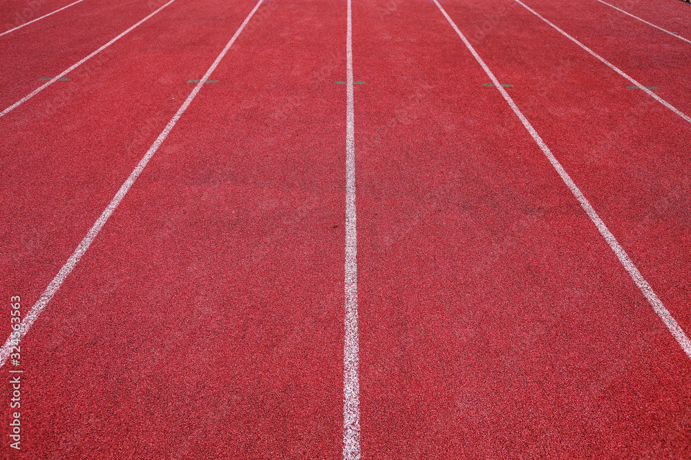 Red running track in stadium