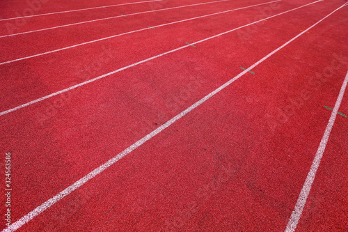 Red running track in stadium