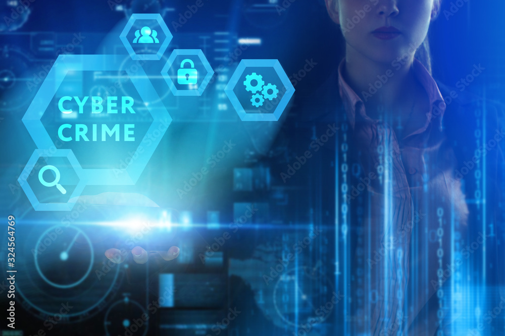 Business, Technology, Internet and network concept. Young businessman working on a virtual screen of the future and sees the inscription: Cyber crime Business, Technology, Internet and network concept. Young businessman working on a virtual screen of the future and sees the inscription: Cyber crime