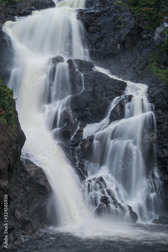 Long exposure of the Ouiatchouan waterfall at Val-Jalbert near Saint Jean lake photo
