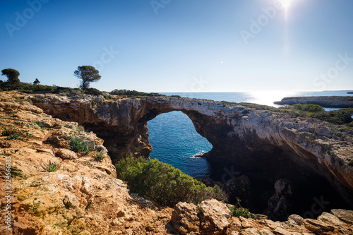 The stony arch in the Cala Varques lagoon © castenoid