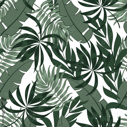 Abstract seamless tropical pattern with colorful plants and leaves on a light background. Beautiful seamless vector floral pattern. Summer colorful hawaiian seamless pattern with tropical plants.