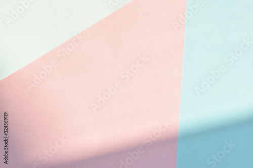 pastel ,soft two tone color or pink and blue, paper with light and shadow as texture fashion background, flat lay